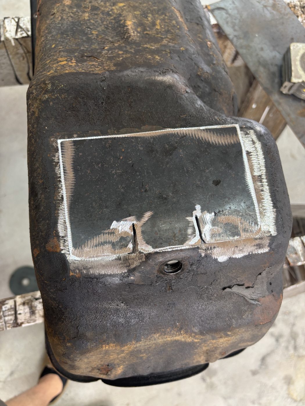 Patch layout marked on 1974 Ford F100 oil pan